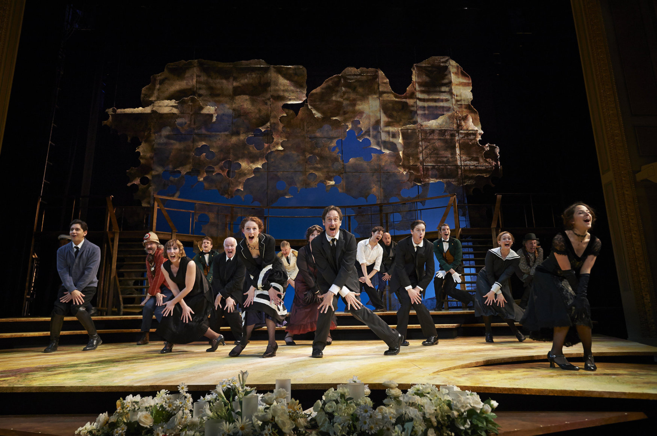 Actors dancing onstage