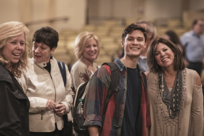 Audience Members Smiling